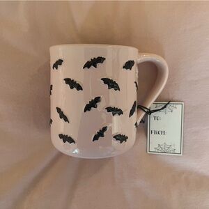 Pink Mug with Embossed Black Bat Design